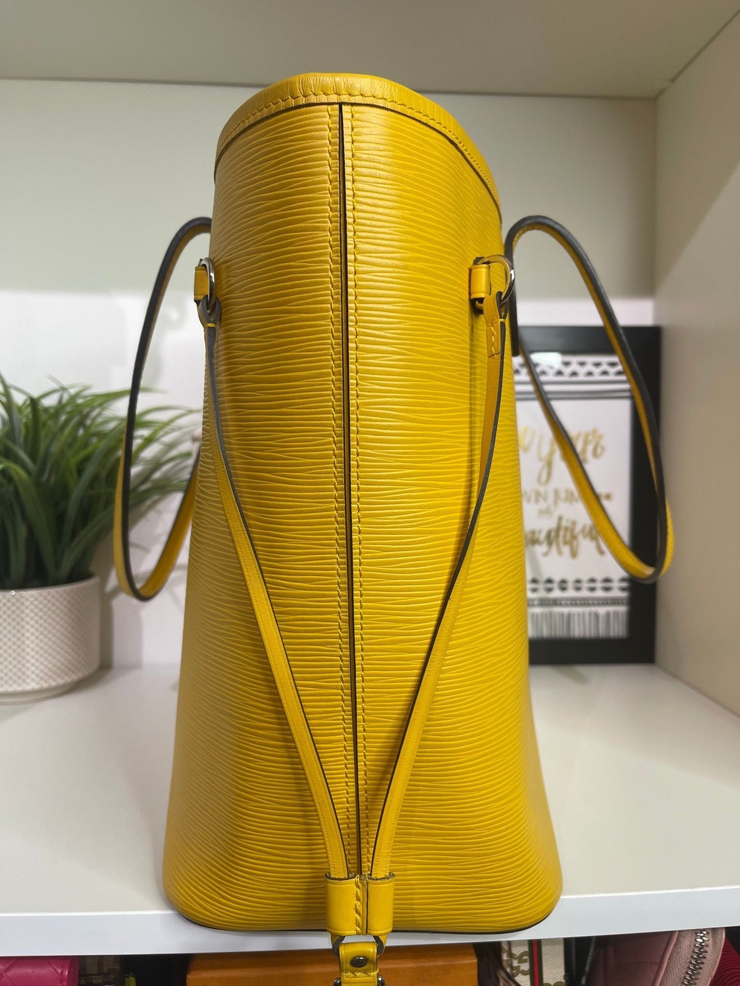 89. Louis Vuitton Yellow Epi Neverfull MM