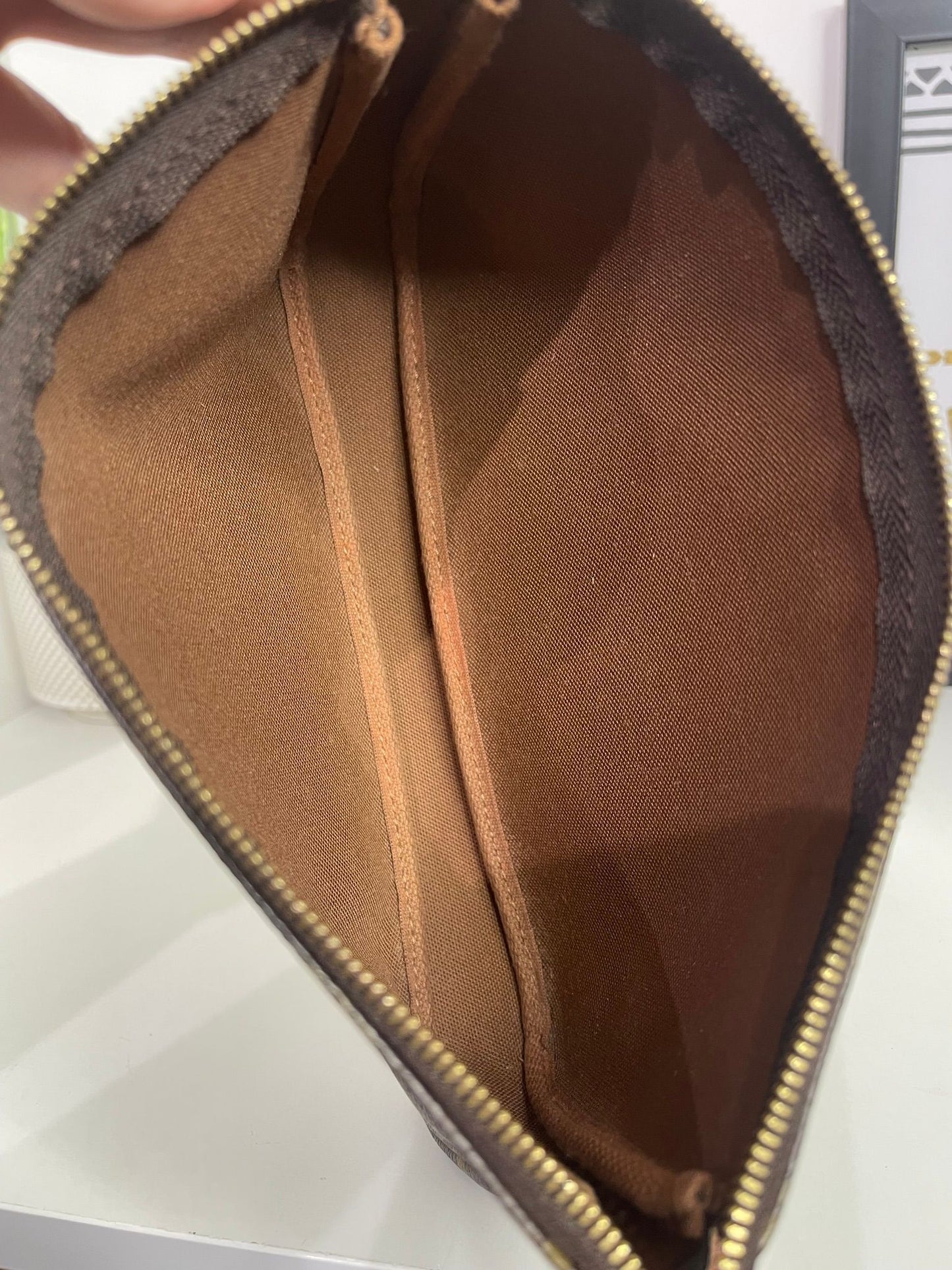 71. Louis Vuitton Monogram Pouchette