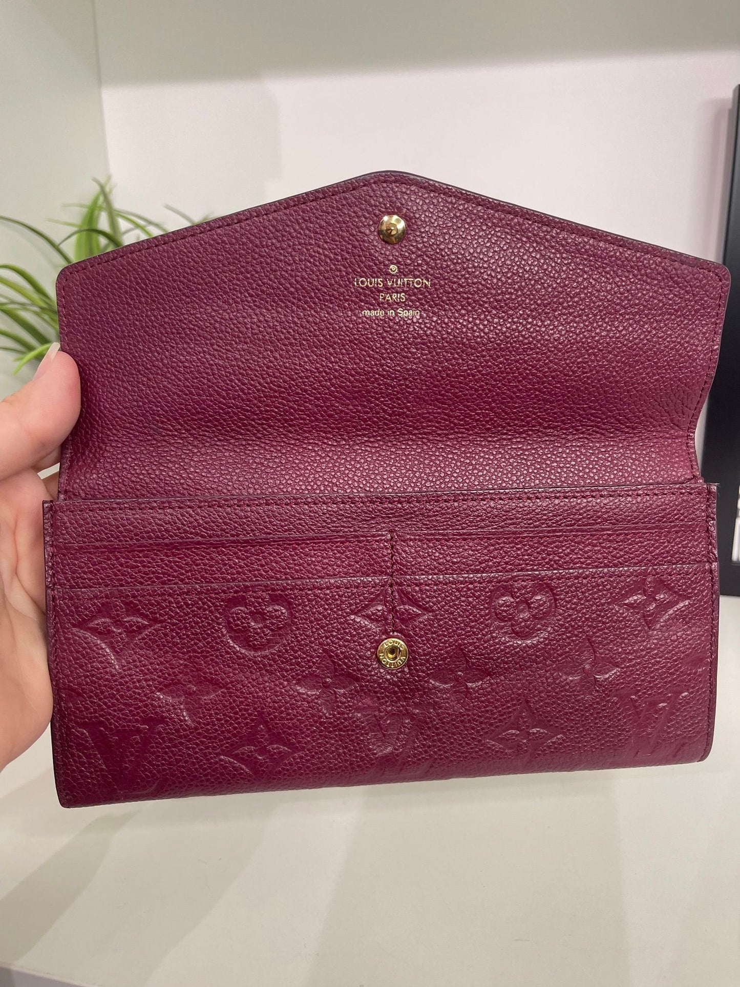 112. Louis Vuitton Aurore Monogram Empreinte Leather Curieuse Wallet