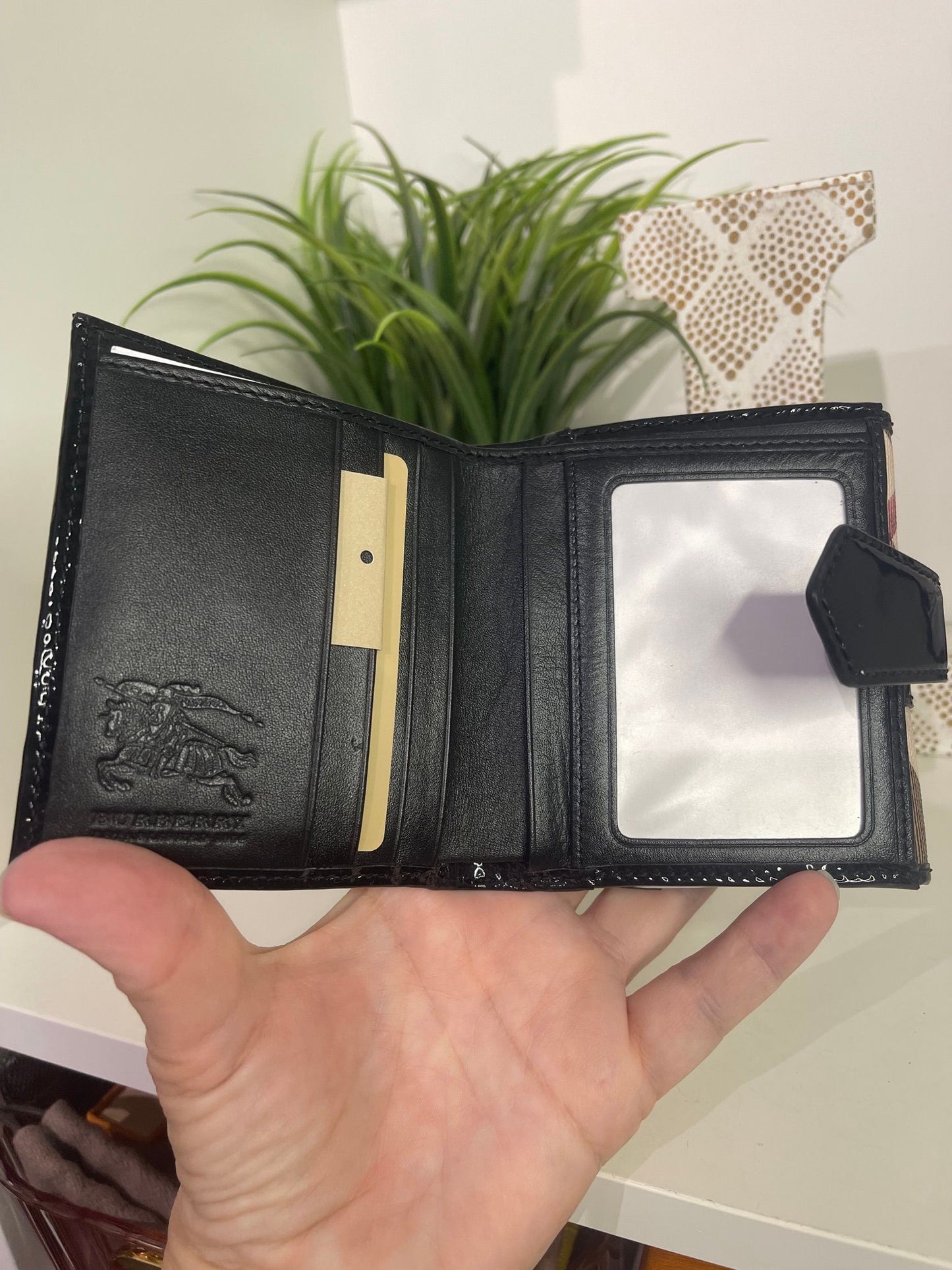 67. Burberry Compact Wallet